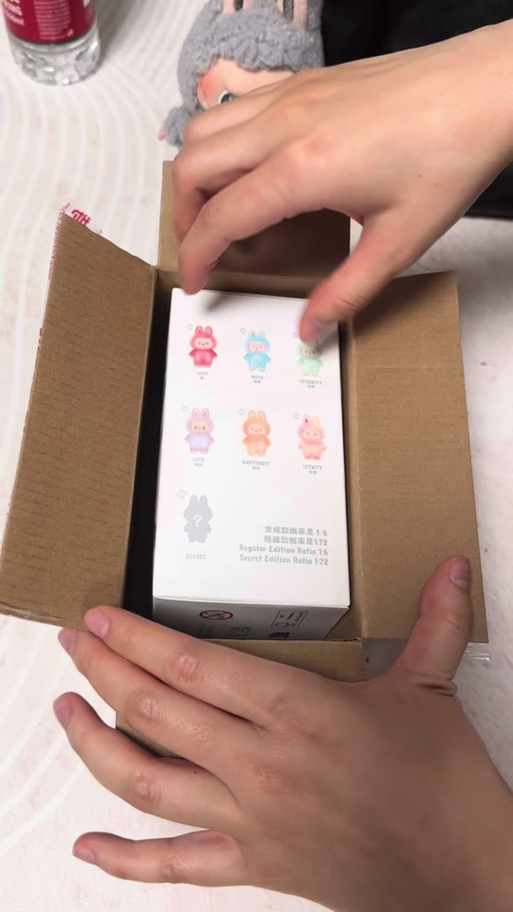泡泡玛特的拆盒技巧图标