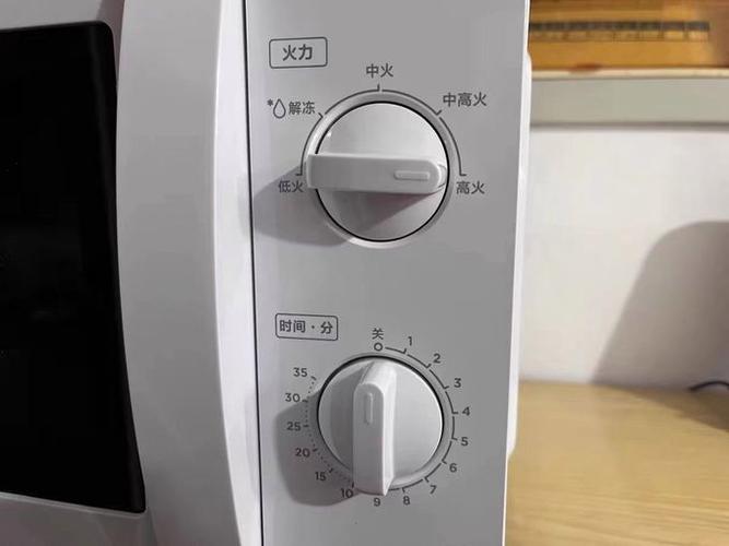 美的微波炉使用说明书图标