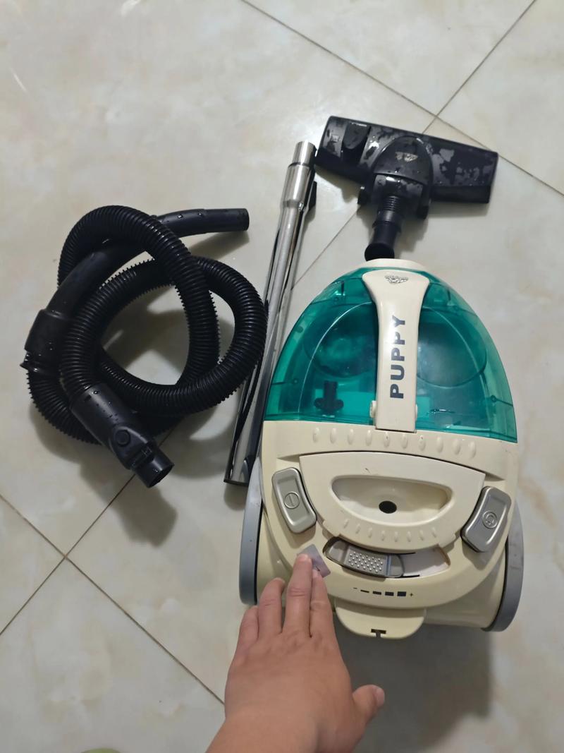 小狗吸尘器吸尘盒怎么拆图标